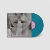 Your Heterosexual Violence Some People Have Too Much To Say sleeve and teal vinyl on a grey background